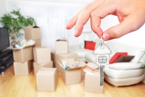 Commercial movers transporting office items in South Hackney