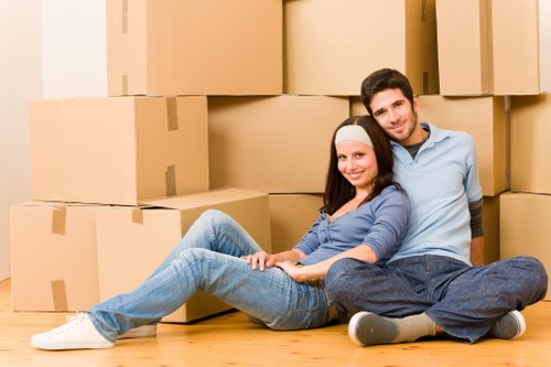 Movers handling furniture and boxes during a South Hackney relocation