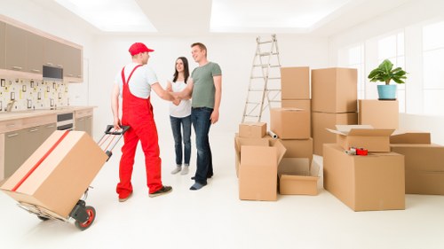 Commercial movers handling office furniture in East London