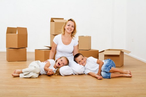 Packed boxes and furniture ready for a local move in South Hackney