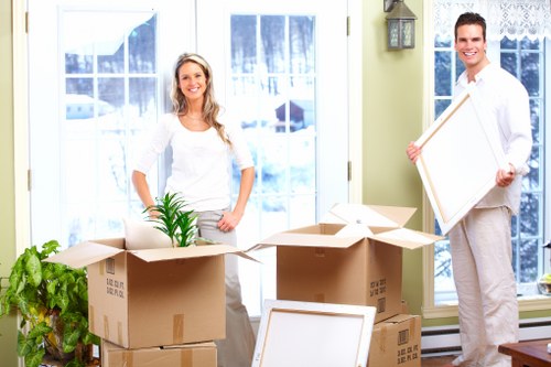 Checklist and packed boxes for a house move in South Hackney